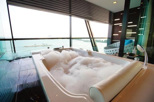 Katil atau katil-katil dalam bilik di @T Boutique Hotel
