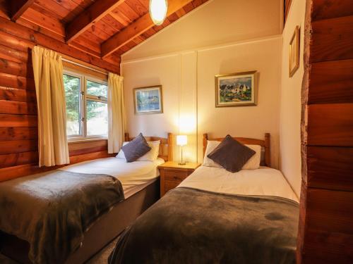 Katil atau katil-katil dalam bilik di Spruce Lodge