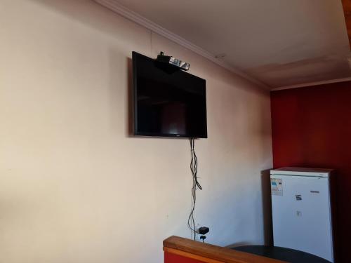 En tv och/eller ett underhållningssystem på Cabañas Costa Norte