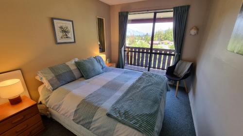 Ένα ή περισσότερα κρεβάτια σε δωμάτιο στο 27 Alpine Avenue