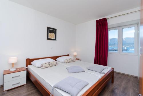 Posteľ alebo postele v izbe v ubytovaní Apartment Jasna By the sea