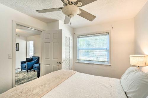 a bedroom with a bed and a ceiling fan at Tropical Port Charlotte Cottage - Walk to Bay! in Port Charlotte