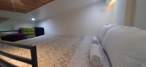 Ein Bett oder Betten in einem Zimmer der Unterkunft JCGA Apartments (Angelo's Burnham)
