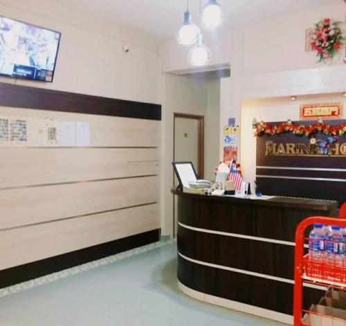 a fast food restaurant with a cash counter in a store at Marina Hotel Kemaman in Kemaman