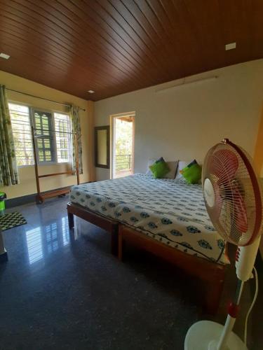 Postel nebo postele na pokoji v ubytování Daisey Dee Homestay