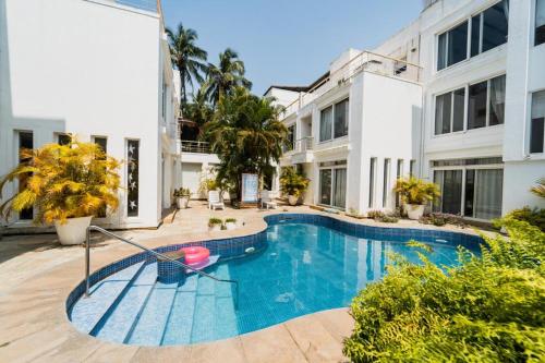 The swimming pool at or close to VILLA M - JIA 3 CANDOLIM GOA 3BHK, Pool Facing, Near Beach, Free Breakfast, Free WIFI and Prime Location
