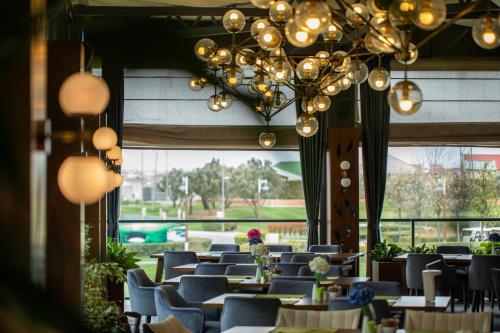 ห้องอาหารหรือที่รับประทานอาหารของ Dreamland Golf Hotel Baku
