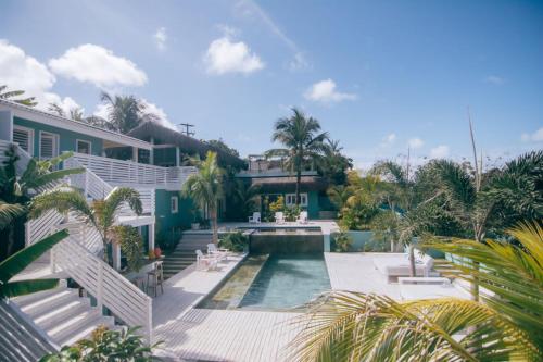 an image of a house with a swimming pool at Cactus Lodge Pipa in Pipa