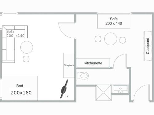 a floor plan of a kitchen and a living area at Patarei Apartment in Tallinn