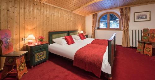 Een bed of bedden in een kamer bij Chalet Taja