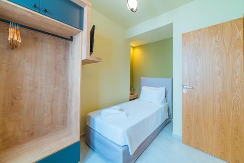 Postel nebo postele na pokoji v ubytování Anatoli Residence