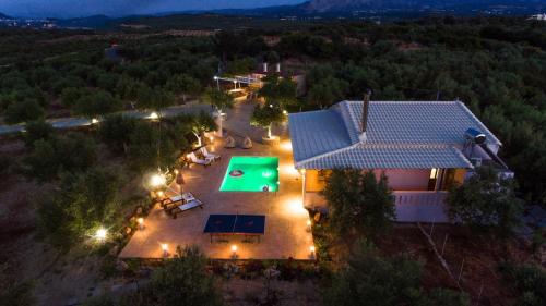 an aerial view of a house with a pool at Villa Avra - With Private Pool in Melidhónion