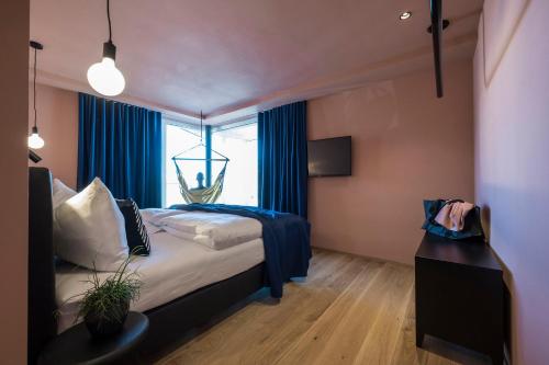 Posteľ alebo postele v izbe v ubytovaní Sport Hotel Passo Carezza