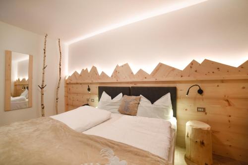 Кровать или кровати в номере Albergo Sporting