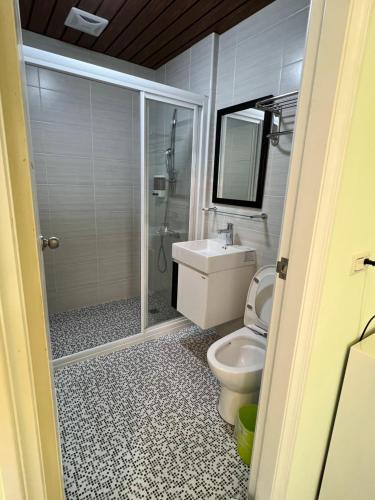 Ένα μπάνιο στο 興達港民宿Xingda Port Homestay