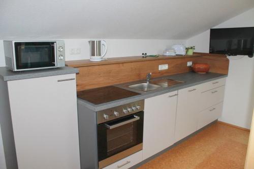 Kuchyň nebo kuchyňský kout v ubytování Ferienwohnung Nitzinger