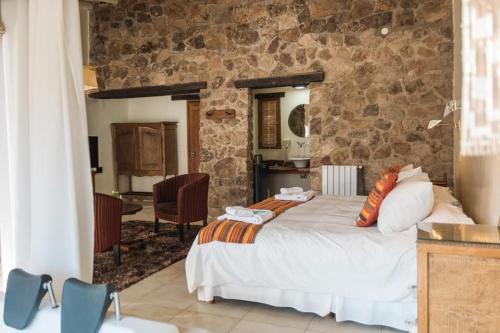 Postel nebo postele na pokoji v ubytování CASAS VIEJAS LODGE
