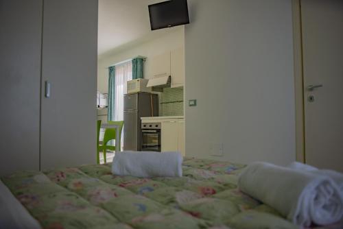Ένα ή περισσότερα κρεβάτια σε δωμάτιο στο Hotel del Sole