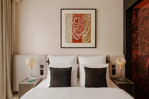 Postel nebo postele na pokoji v ubytování Warszauer Hotel