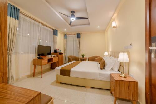 Μια τηλεόραση ή/και κέντρο ψυχαγωγίας στο Amber Beach Hotel