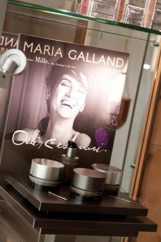 a poster of a woman in a magazine at Superior Hotel Tirolerhof - Zell am See in Zell am See