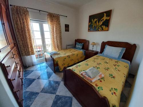 Ένα ή περισσότερα κρεβάτια σε δωμάτιο στο Casa Machado