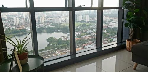 a large window with a view of a river at MCity Jalan Ampang KLCC in Kuala Lumpur