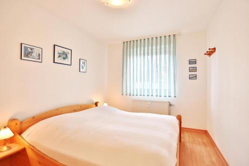 Кровать или кровати в номере Seesternresidenz Seesternresidenz Appartement 8
