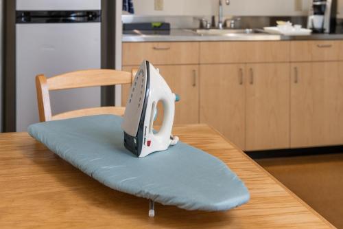 a router sitting on a blue pillow on a table at Harbor Lite Lodge in Fort Bragg
