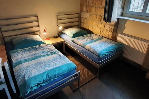 Postel nebo postele na pokoji v ubytování Villa Haniel Apartment Leo