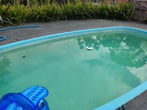 Kolam renang di atau dekat dengan Pousada Vila dos Sonhos