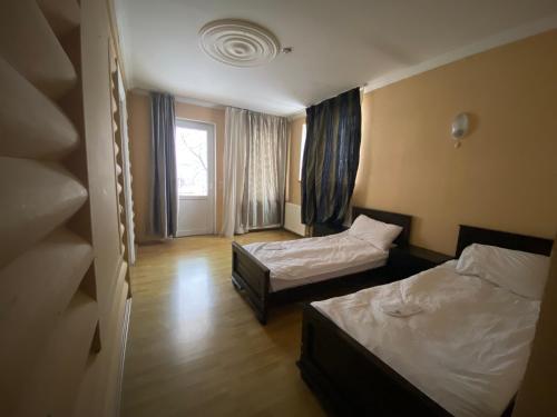 Cama o camas de una habitación en Art Villa Bakuriani