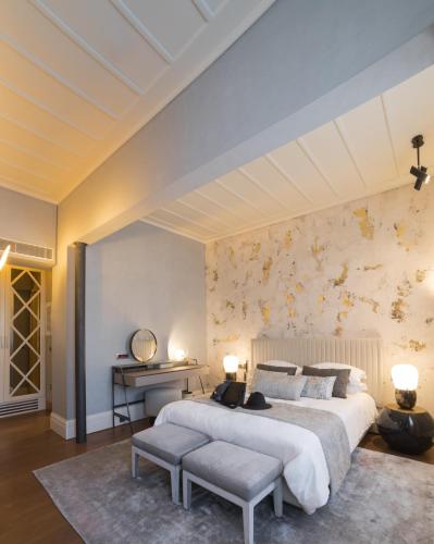 Letto o letti in una camera di Castellano Hotel & Suites