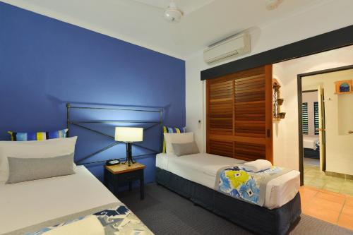Una cama o camas en una habitación de Reef Club Resort