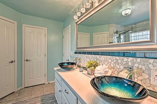 a bathroom with two sinks and a large mirror at Near Trails, Lakes and Golf Pinetop Home with Deck in Pinetop-Lakeside
