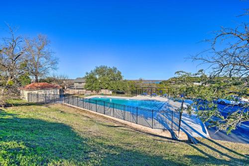 an image of a swimming pool in a yard at Steps to Lake! Charming Cabin Pool Access and Decks in Granbury