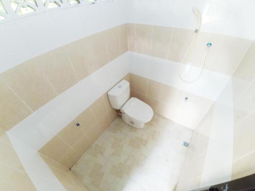 Kúpeľňa v ubytovaní Grand Purwomartani Homestay Jogja