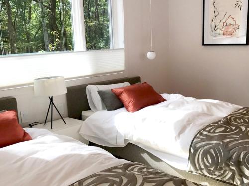 מיטה או מיטות בחדר ב-Guest House Paper Moon - Vacation STAY 45029v