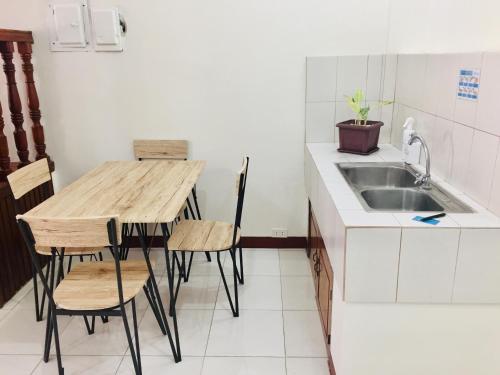 Kuchyň nebo kuchyňský kout v ubytování JPrime Apartelle