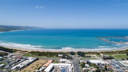 an aerial view of a beach and the ocean at Point of View Villas in Apollo Bay