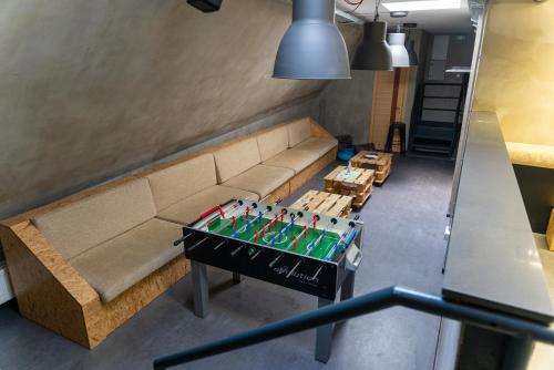 a living room with a couch and a table at Main Square Hostel in Zagreb