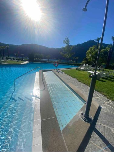 Der Swimmingpool an oder in der Nähe von Holiday on The Lake Lugano 2