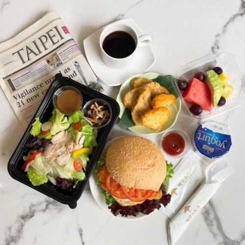 a lunch box with a sandwich and a salad and a cup of coffee at Fullon Hotel Taipei, Central in Taipei