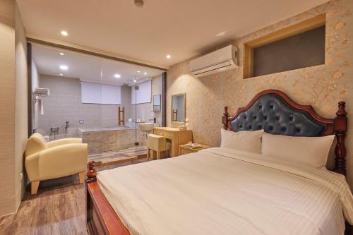 Cama o camas de una habitación en Kyokusui Hotspring Hotel