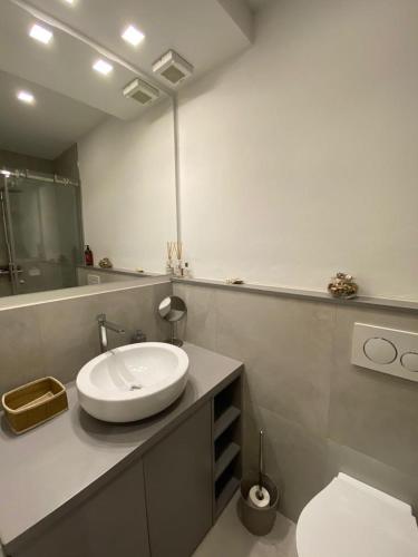 Ein Badezimmer in der Unterkunft EM home01