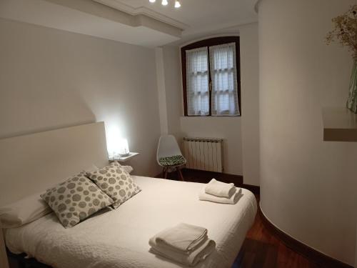 Postel nebo postele na pokoji v ubytování LOA GETARIA