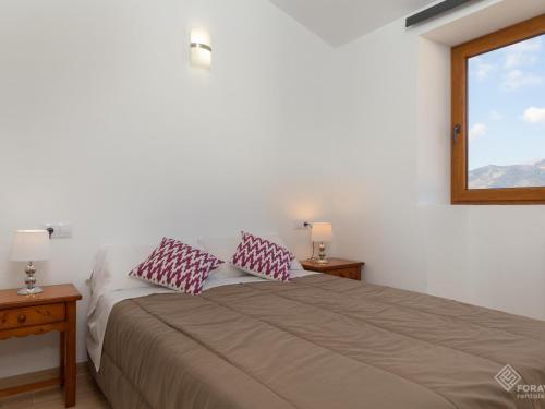 Postel nebo postele na pokoji v ubytování Casa lluna