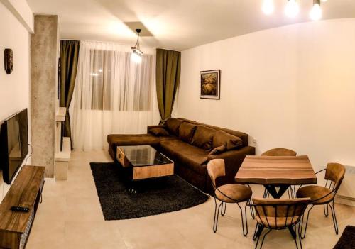 Et opholdsområde på Луксозен Апартамент Мечи Чал - Апартхотел Манастира 2