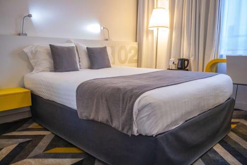 Ένα ή περισσότερα κρεβάτια σε δωμάτιο στο Best Western Hotel San Benedetto