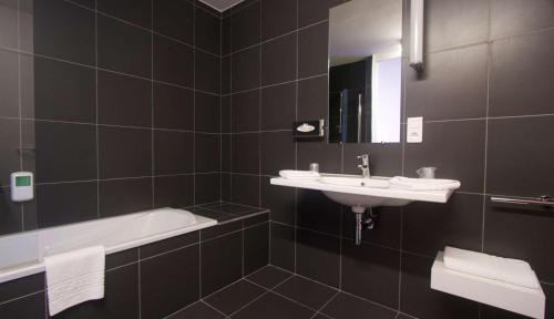 Ένα μπάνιο στο Best Western Hotel San Benedetto